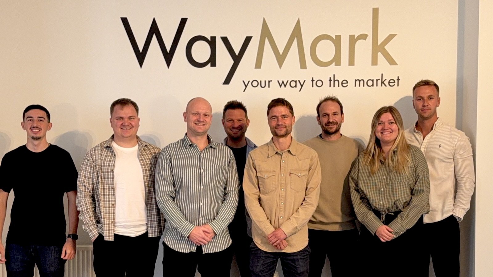 The Aarhus team beneath the WayMark logo